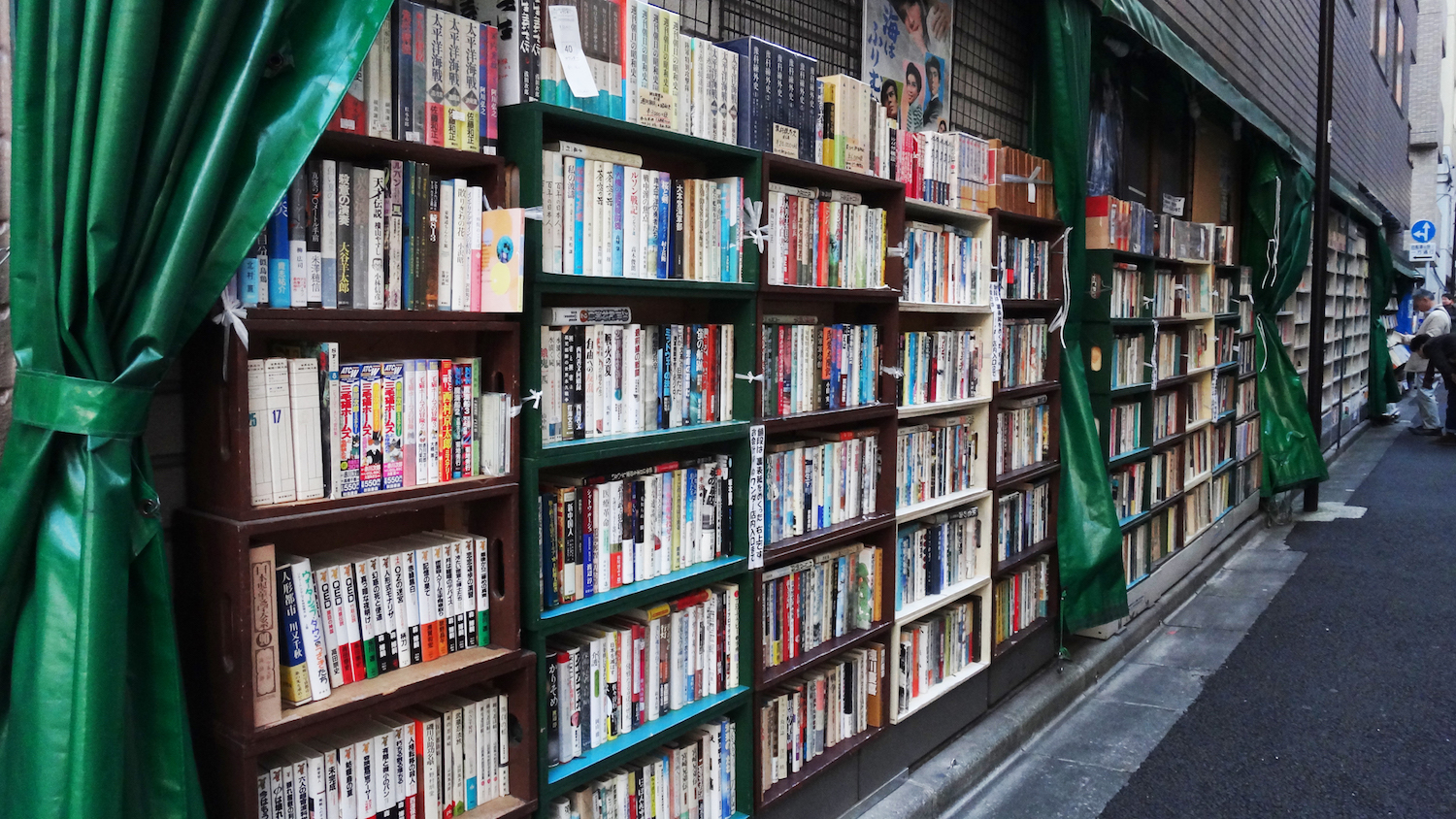 Ogawa Bookstore shelves in back alley